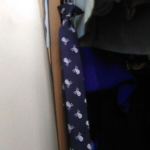 Boys clip on tie Navy skulls and cross bones